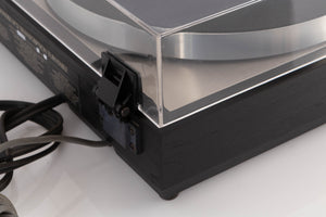 Rear left corner corner of a used Linn LP12 Turntable / Basik Plus Tonearm / K-9 Cartridge in a Black Ash finish