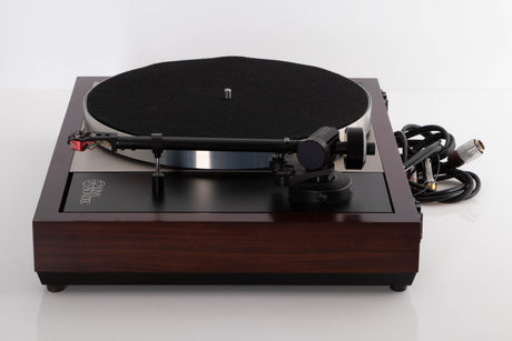 Side view of a used Linn LP12 Turntable with Black Ittok Tonearm and Troika Cartridge