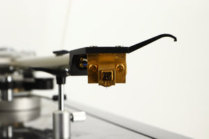 Close up view of a Linn LP12 Turntable in Black Gloss finish with Funk Firm Vector Link Upgrade, Ittok Tonearm, and Dynavector Karat D17D3 Cartridge