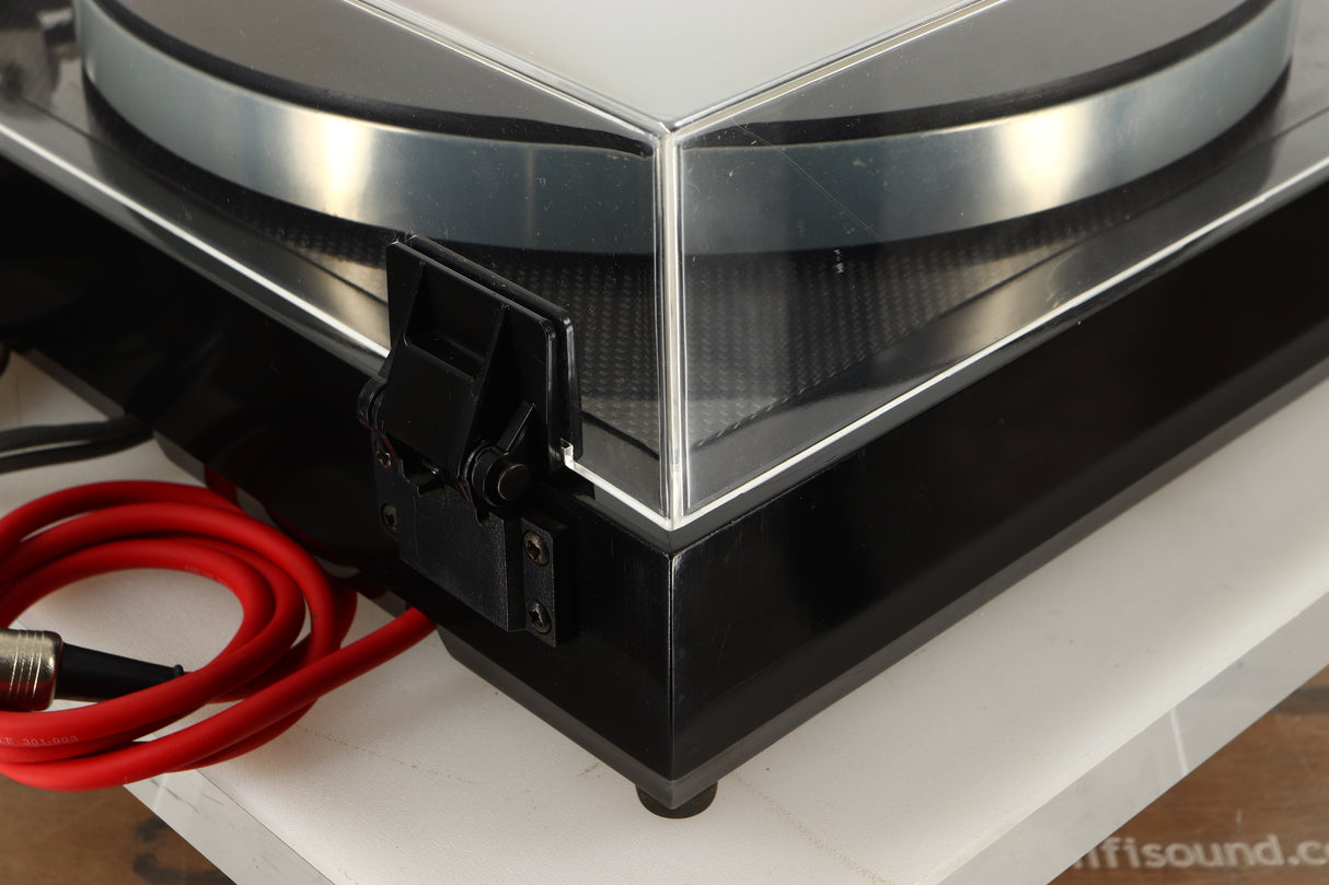 Rear right corner view of a Linn LP12 Turntable in Black Gloss finish with Funk Firm Vector Link Upgrade, Ittok Tonearm, and Dynavector Karat D17D3 Cartridge