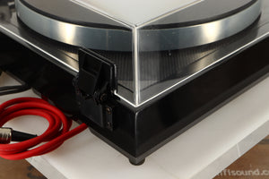 Rear right corner view of a Linn LP12 Turntable in Black Gloss finish with Funk Firm Vector Link Upgrade, Ittok Tonearm, and Dynavector Karat D17D3 Cartridge