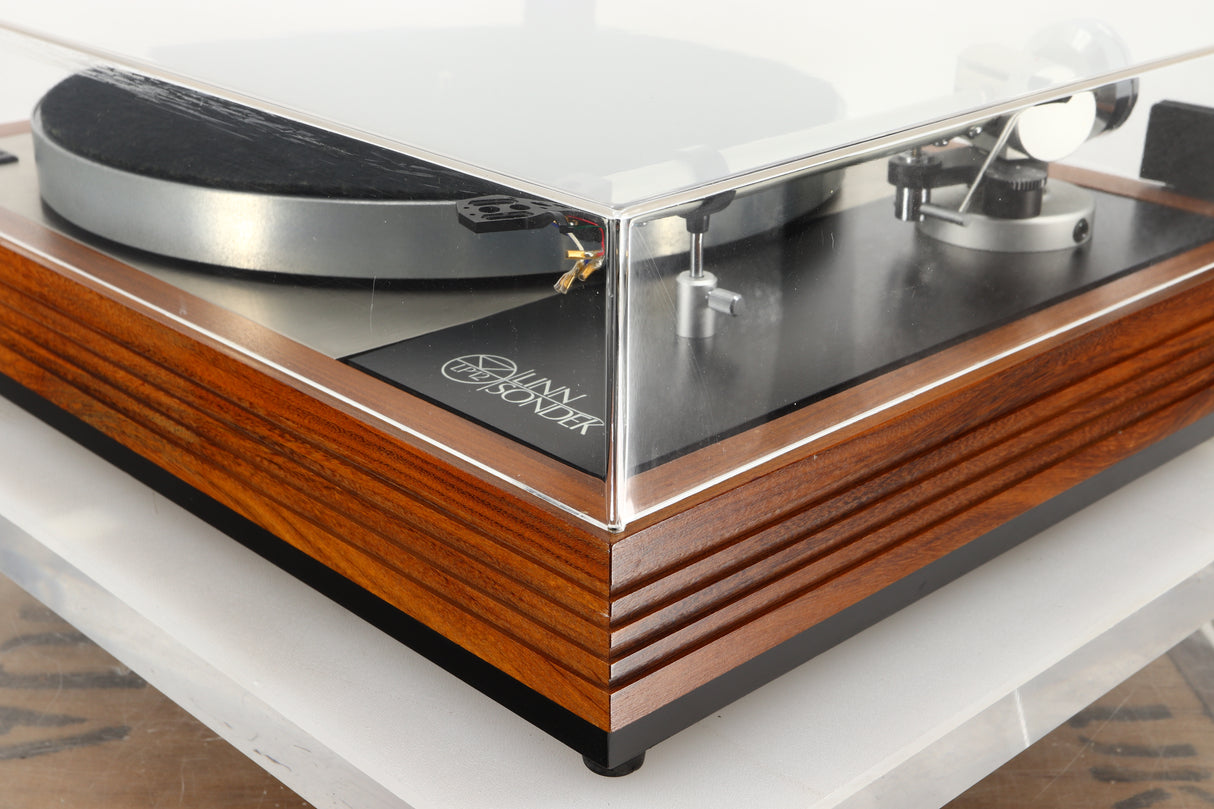 Front right corner of a used Linn LP12 Turntable / Ittok Tonearm / Hercules Power Supply in a afromosia finish