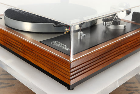 Front right corner of a used Linn LP12 Turntable / Ittok Tonearm / Hercules Power Supply in a afromosia finish