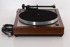 Side view of a used Linn LP12 Turntable in Afromosia with Akito Tonearm and Adikt Cartridge