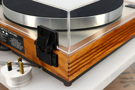 Rear right corner view of a used Linn LP12 Turntable in Afromosia finish fitted with a Valhalla power supply board, and an Ekos tonearm 