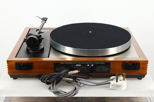 Rear view of a used Linn LP12 Turntable in Afromosia finish fitted with a Valhalla power supply board, and an Ekos tonearm 