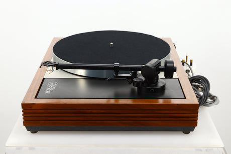 Side view of a used Linn LP12 Turntable in Afromosia finish fitted with a Valhalla power supply board, and an Ekos tonearm 
