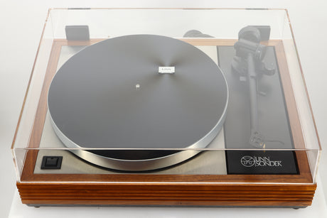 view of a used Linn LP12 Turntable in Afromosia finish fitted with a Valhalla power supply board, and an Ekos tonearm showing the lid
