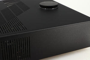 Close up of a used Linn Majik DSM5 Network Music System in a black finish showing light scratch on left side