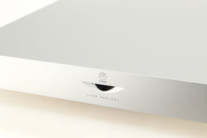 Close up of a used Linn Radikal 2 Utopic Turntable Power Supply in a silver finish showing some of the fascia