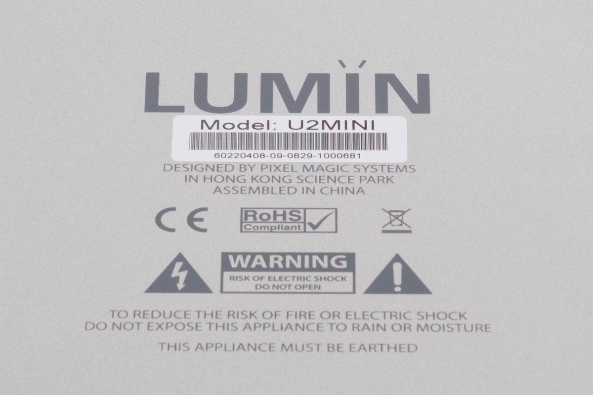 Close up of a used Lumin U2 Mini Network Streamer in a Silver finish showing serial number