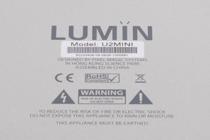 Close up of a used Lumin U2 Mini Network Streamer in a Silver finish showing serial number