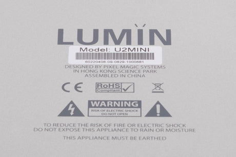 Close up of a used Lumin U2 Mini Network Streamer in a Silver finish showing serial number