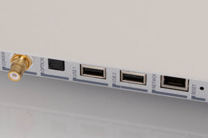 Close up of a used Lumin U2 Mini Network Streamer in a Silver finish showing light scratches on rear