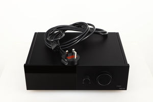 Top of a used Lyngdorf TDAI-1120 Integrated Streaming System in a black finish showing Mains Cable