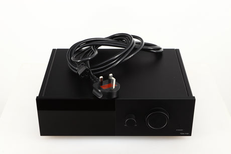 Top of a used Lyngdorf TDAI-1120 Integrated Streaming System in a black finish showing Mains Cable