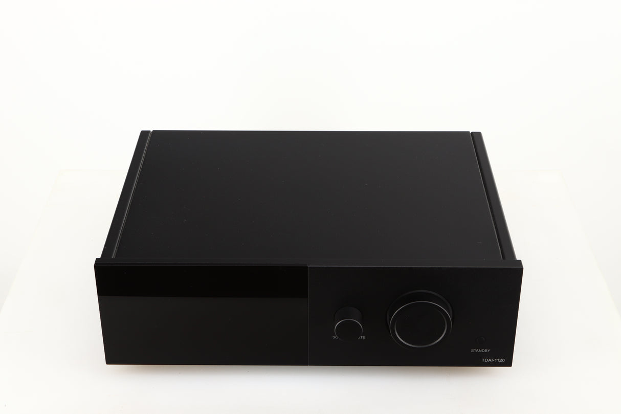 Top of a used Lyngdorf TDAI-1120 Integrated Streaming System in a black finish