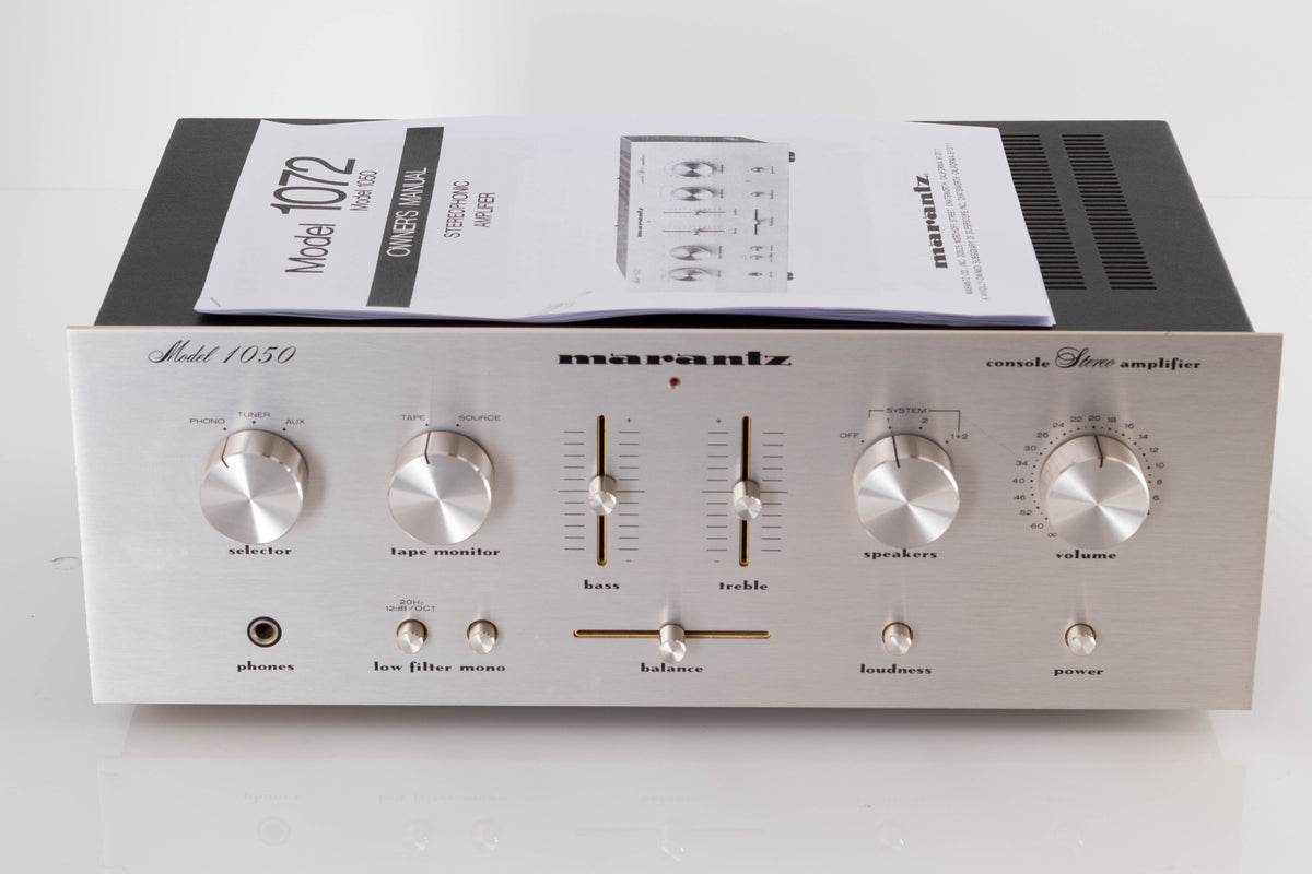 Front view of a used Marantz 1050 Integrated Amplifier with manual