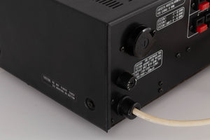 Rear left corner view of a used Marantz 1050 Integrated Amplifier