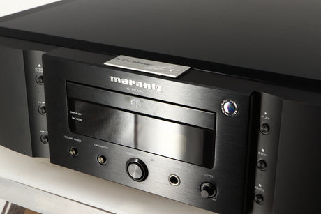 Close up of a used Marantz 30th Anniversary SA-KI-PEARL SACD Player in a black finish showing some marks on fascia