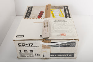 Box for a used Marantz CD-17 CD Player in a black finish showing Manual, Remote and Batteries