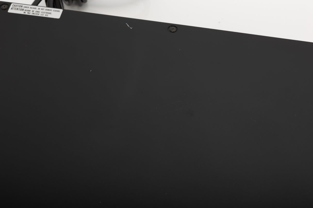 Close up of a used Marantz CD-17 CD Player in a black finish showing scratches on top