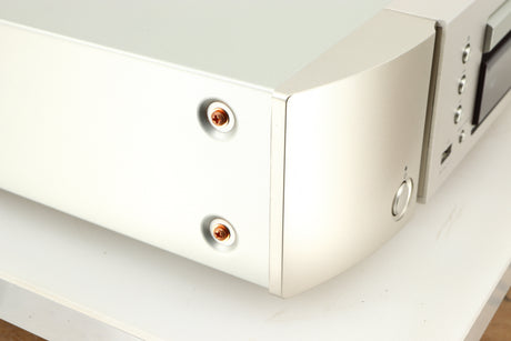 Front left corner of a used Marantz CD6006 UK Edition CD Player in a silver finish