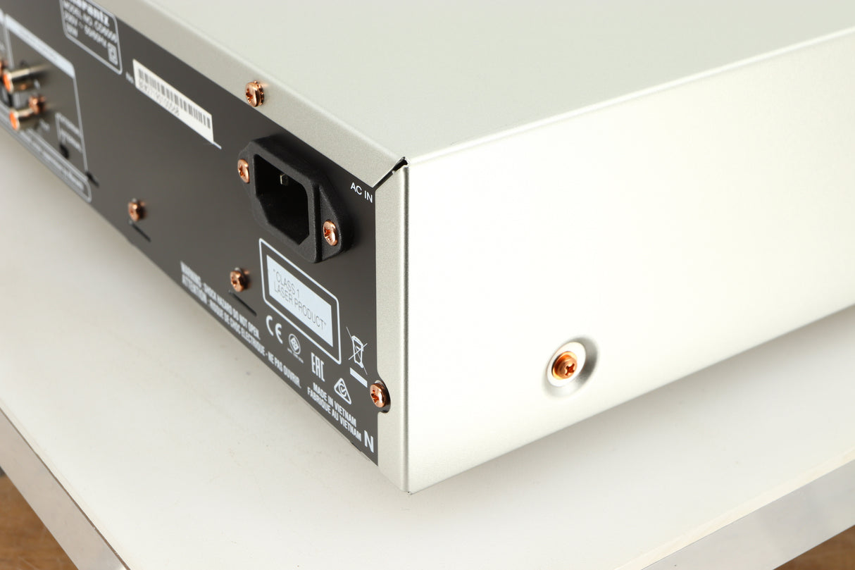 Rear left corner of a used Marantz CD6006 UK Edition CD Player in a silver finish