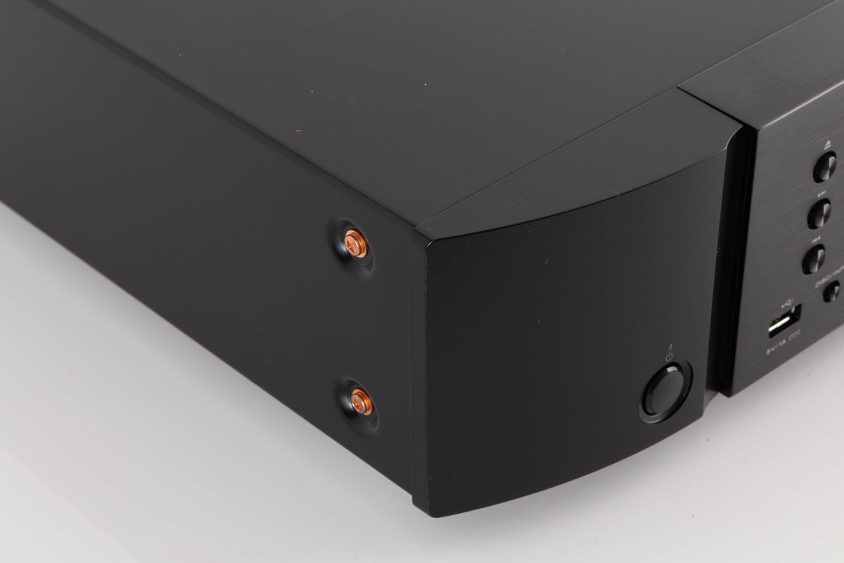 Front left corner of a used Marantz CD6007 CD Player in a Black finish