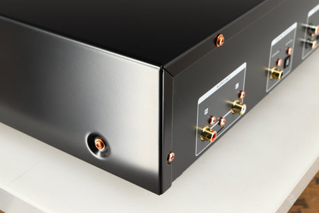 Rear right corner of a used Marantz CD6007 CD Player in a black finish
