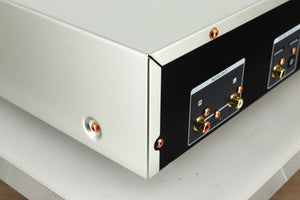 Close up view of the rear left corner of a used Marantz CD6007 CD Player in silver finish 