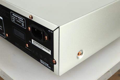 Close up view of the rear right corner of a used Marantz CD6007 CD Player in silver finish 