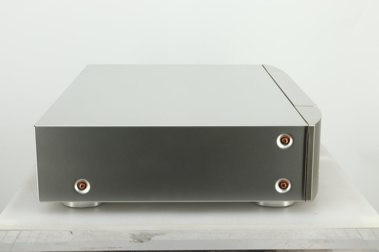 Side view of a used Marantz CD6007 CD Player in silver finish 