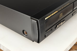 Front left corner of a used Marantz CD63 KI Signature CD Player in a black finish