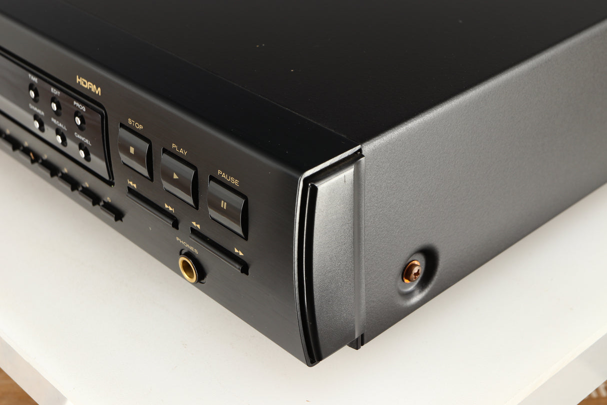 Front right corner of a used Marantz CD63 KI Signature CD Player in a black finish