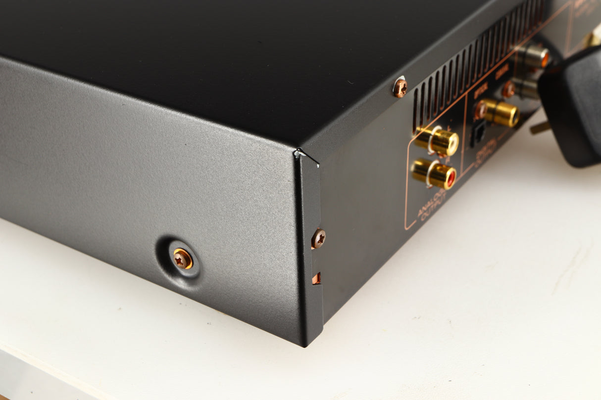 Rear right corner of a used Marantz CD63 KI Signature CD Player in a black finish