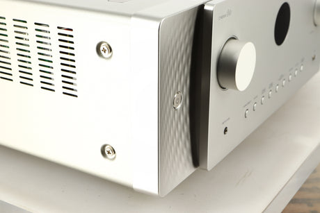 Front left corner of a used Marantz Cinema 60 AV Receiver in a silver finish
