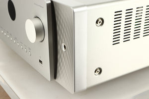 Front right corner of a used Marantz Cinema 60 AV Receiver in a silver finish