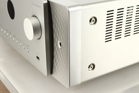 Front right corner of a used Marantz Cinema 60 AV Receiver in a silver finish