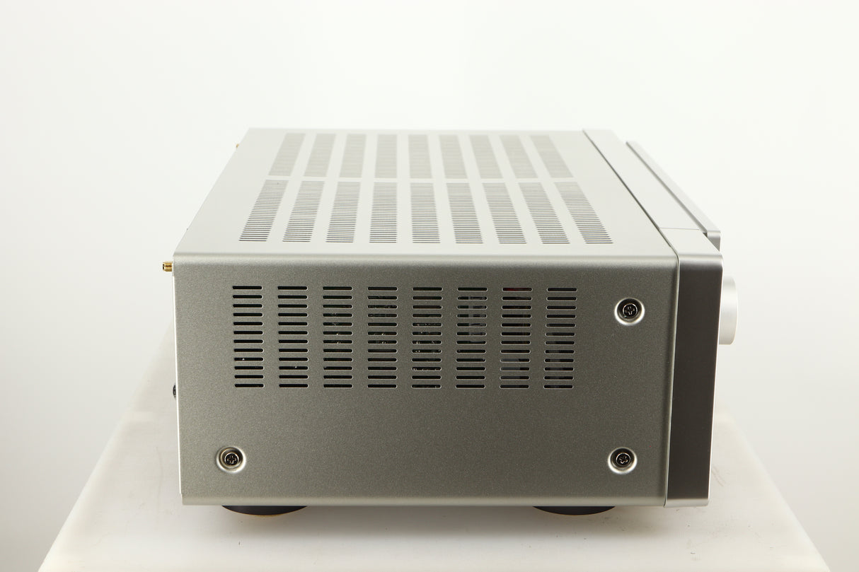 Left side view of a used Marantz Cinema 60 AV Receiver in a silver finish