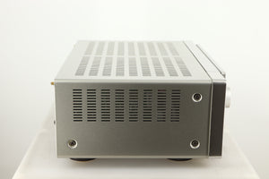 Left side view of a used Marantz Cinema 60 AV Receiver in a silver finish