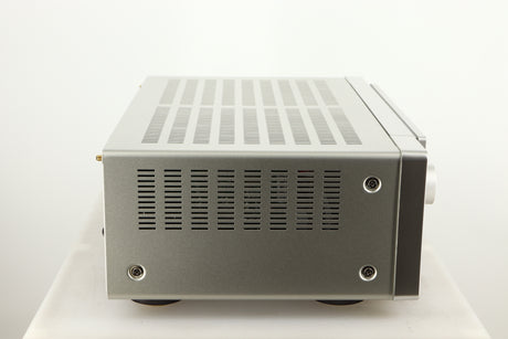 Left side view of a used Marantz Cinema 60 AV Receiver in a silver finish