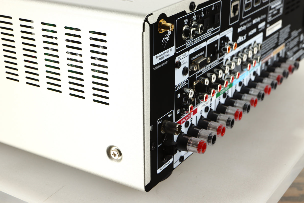 Rear right corner of a used Marantz Cinema 60 AV Receiver in a silver finish