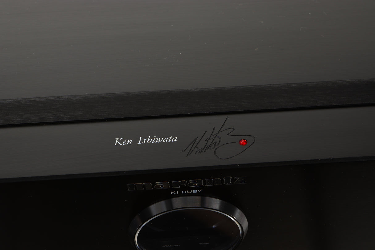 Close up of a used Marantz KI Ruby Integrated Amplifier in a black finish showing fascia edge