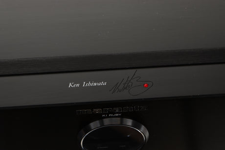 Close up of a used Marantz KI Ruby Integrated Amplifier in a black finish showing fascia edge