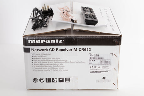 Box of a used Marantz M-CR612 Network CD Receiver in Black with mains cable, manual, remote, and aerial