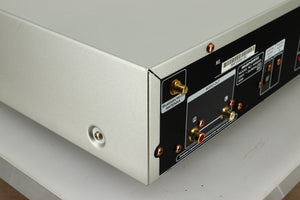 Close up view the back left of a used Marantz NA6005 Network Player in silver finish 