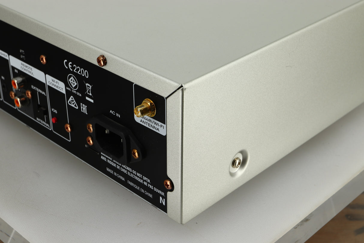 Close up view the back right of a used Marantz NA6005 Network Player in silver finish 
