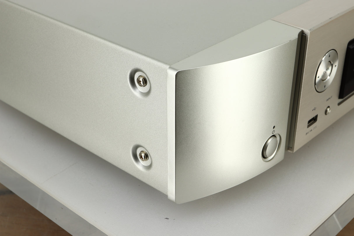 Close up view the front left of a used Marantz NA6005 Network Player in silver finish 