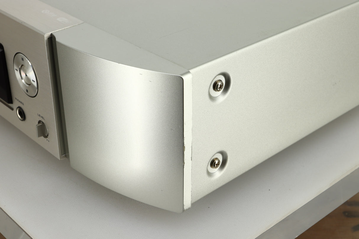 Close up view the front right of a used Marantz NA6005 Network Player in silver finish 